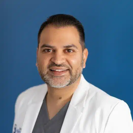 Dr. Ankur Dharia, an accomplished, board-certified foot and ankle surgeon with over two decades of experience.